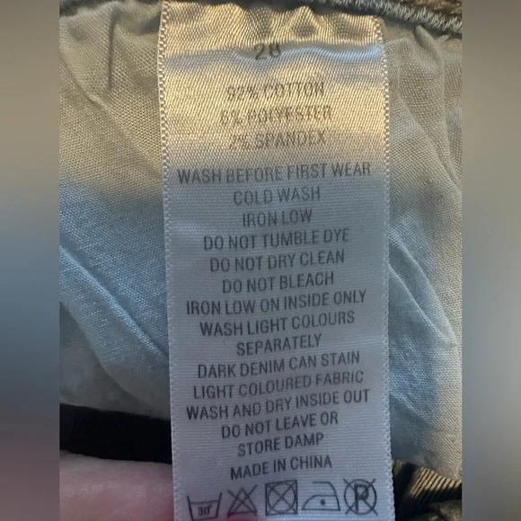 Light Wash High-Rise Distressed Flare Jeans - Women - Picture 10 of 11